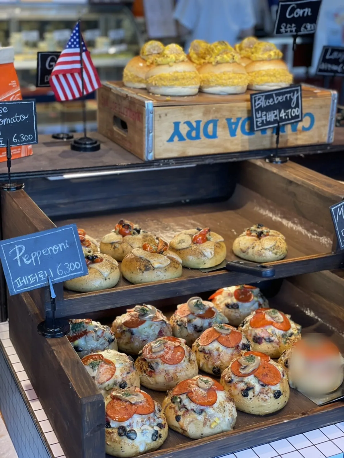 Visually overwhelming bagel display at Orange Bagel