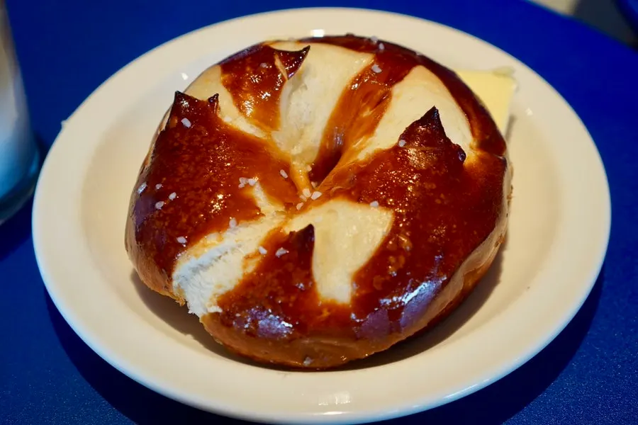 Cross-section of the orange bagel showing its orange flavor