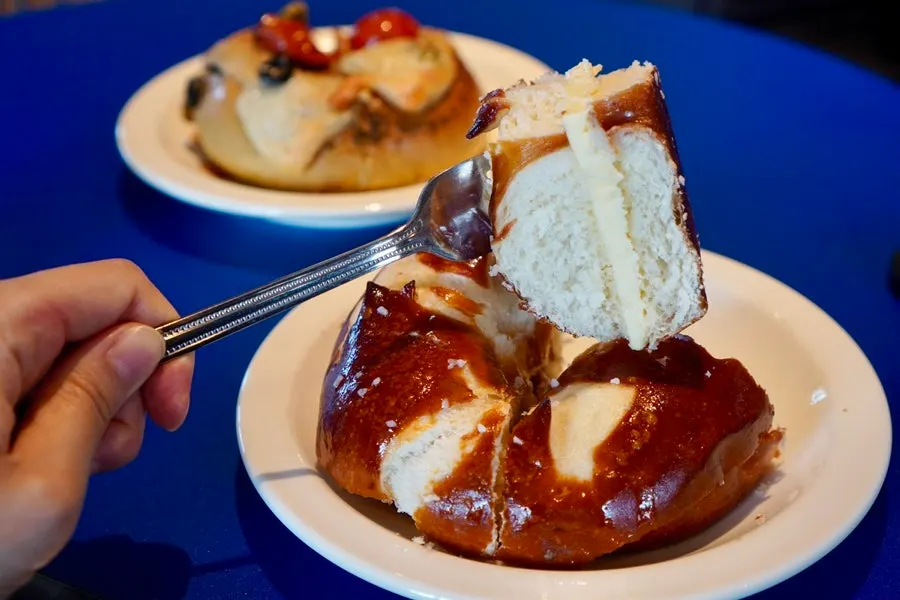 Close-up of the orange bagel on a plate