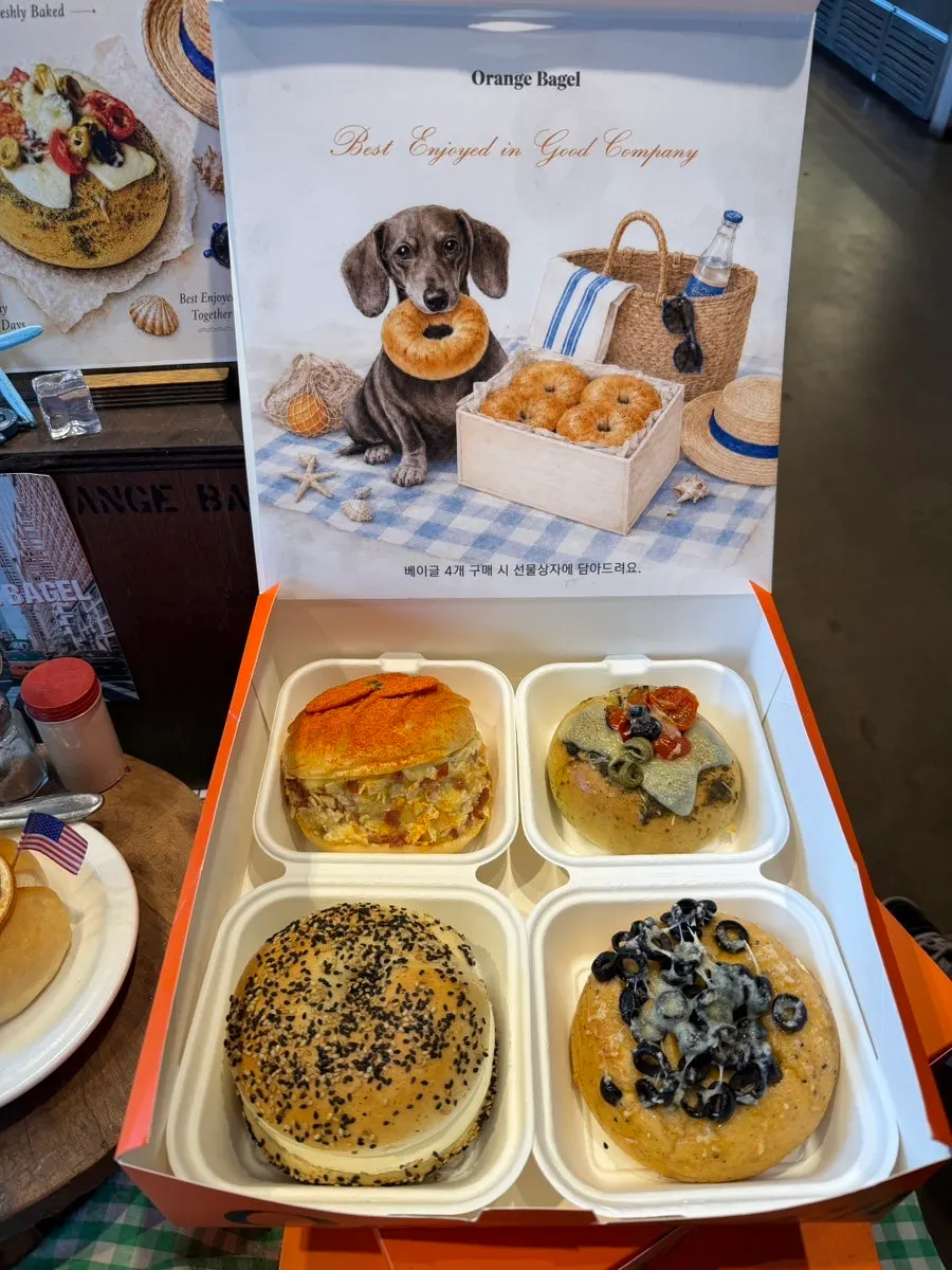 Tray displaying many varieties of bagels