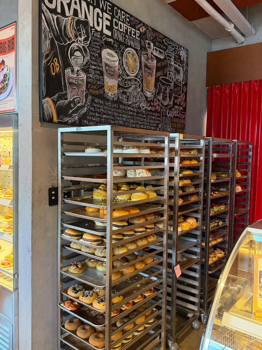 Close-up view of the bagel display counter