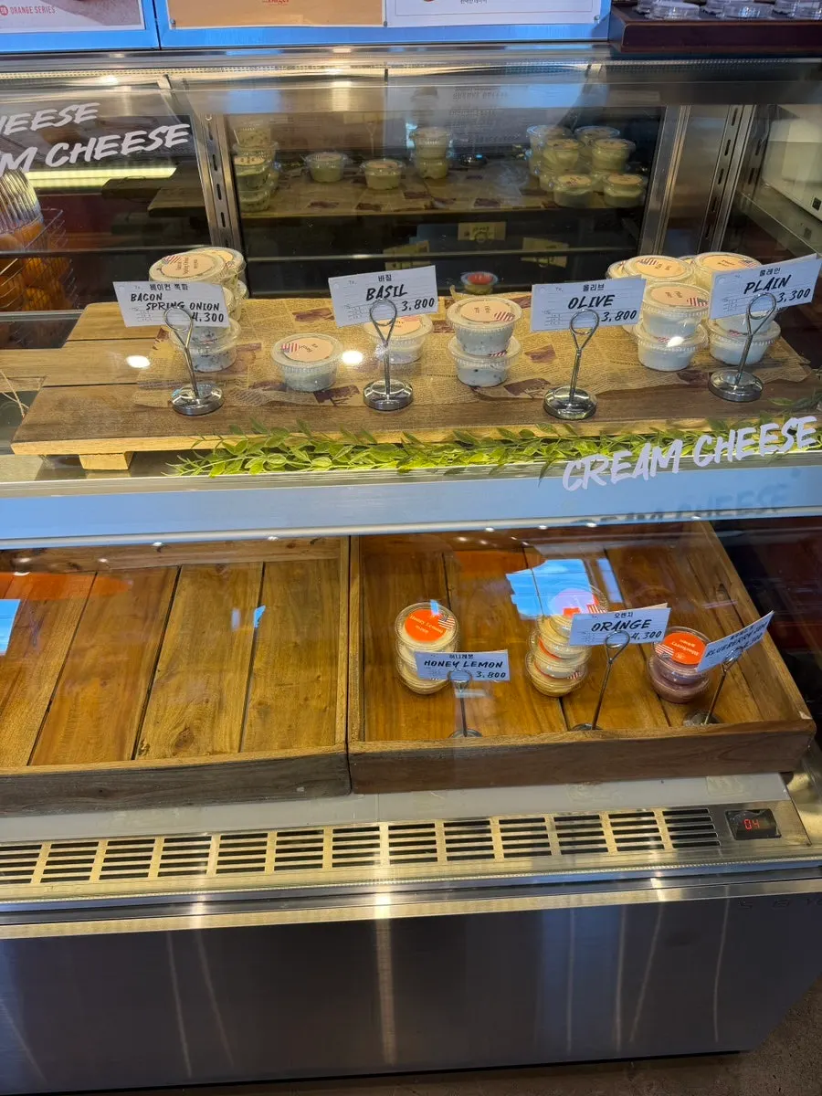 Bagels displayed in the refrigerated showcase