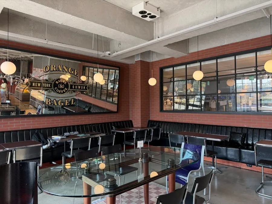 Exterior of the three-floor Orange Bagel store