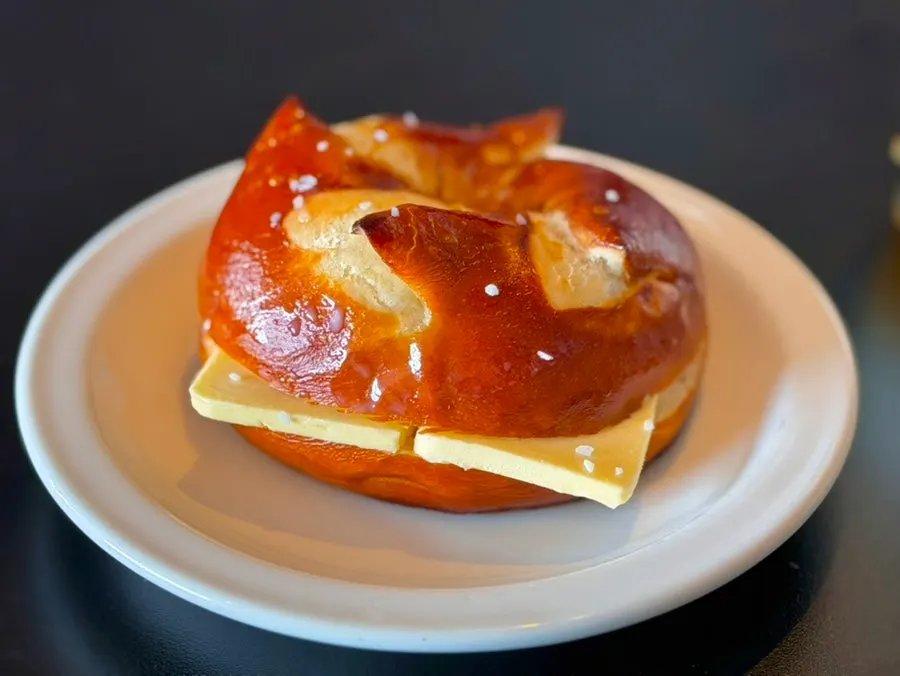 Bagels and drink set out on the table