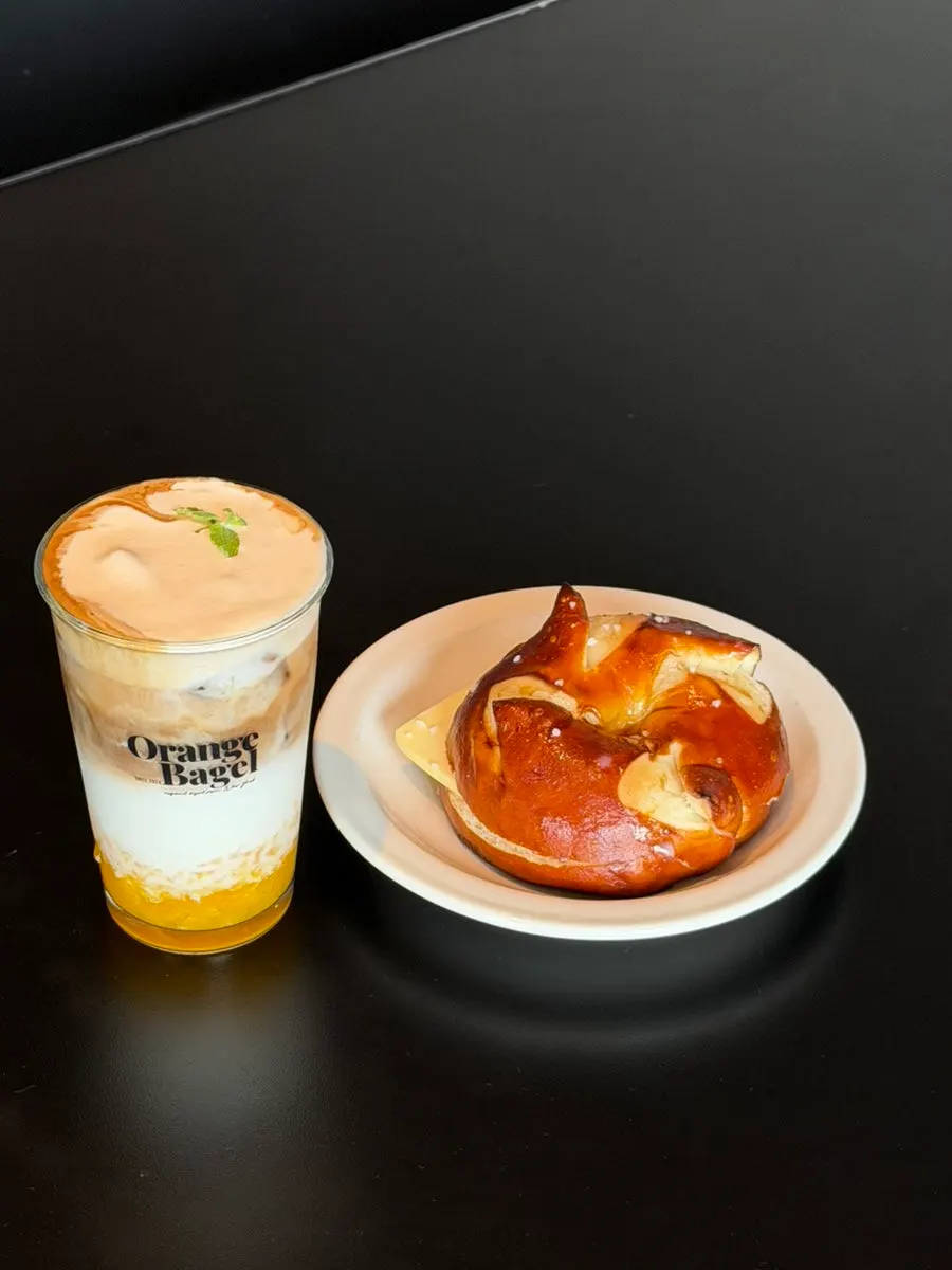 A table set with several bagel varieties