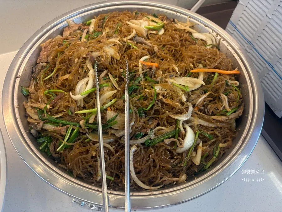A plate of japchae refilled three times