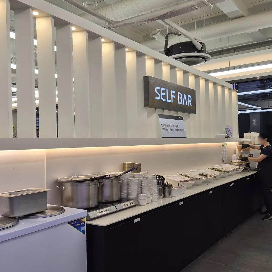 Self-serve banchan bar corner at Godeungeo Myeongpumi Doeda Suwon Branch