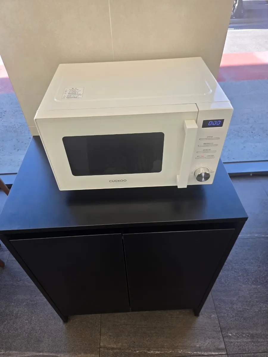 Baby chair and microwave on the way to the self-serve bar