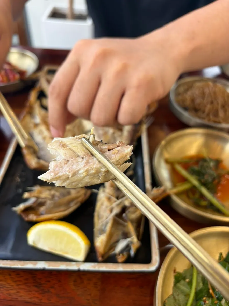 Cross-section of the grilled mackerel showing moist flesh