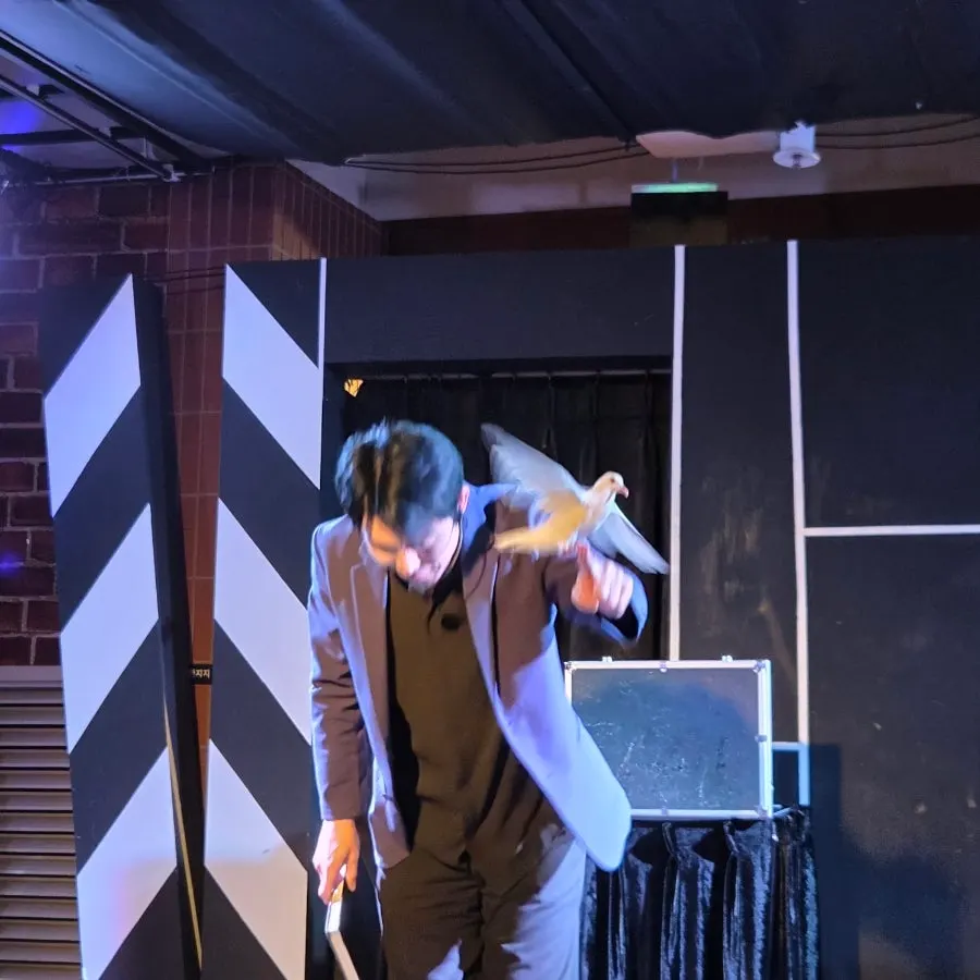 A magic trick performed with audience interaction