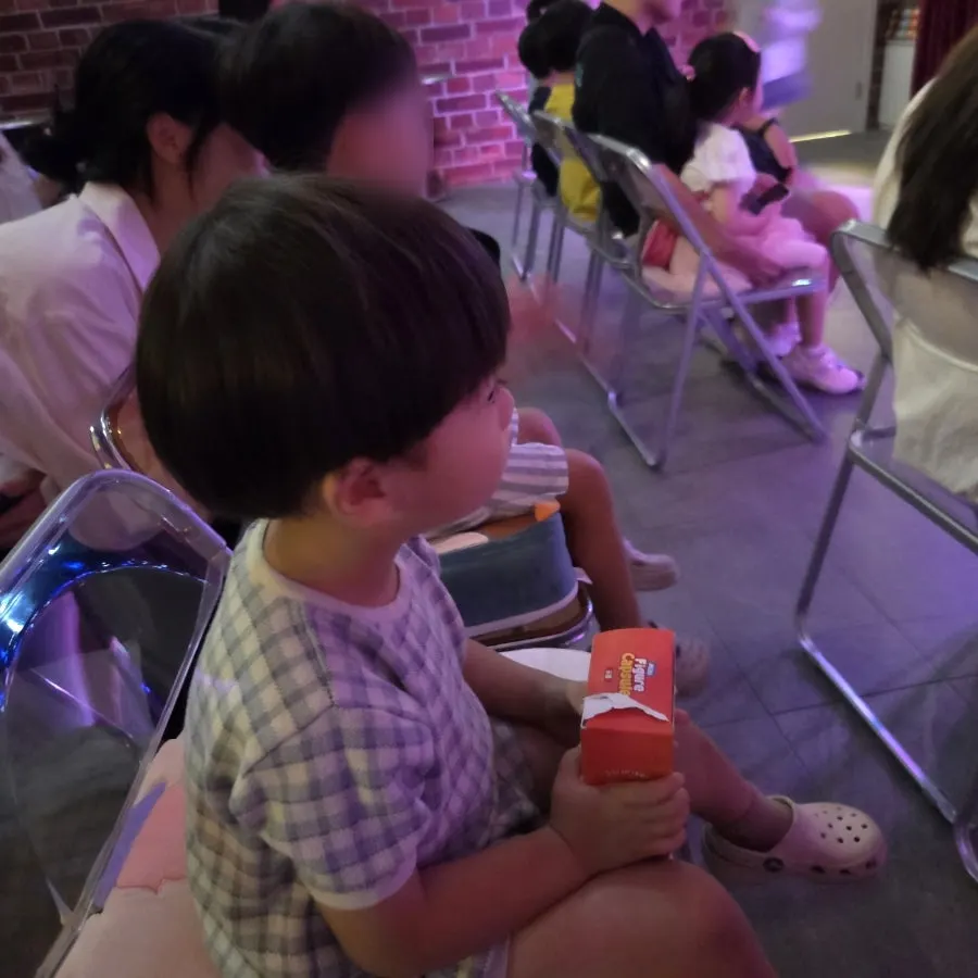 The magician holding magic tools during the show