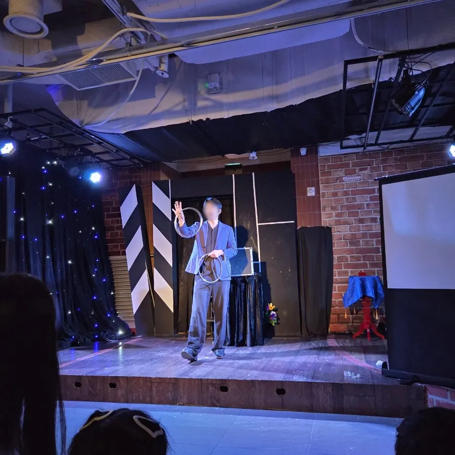 A pigeon appears during the magic trick
