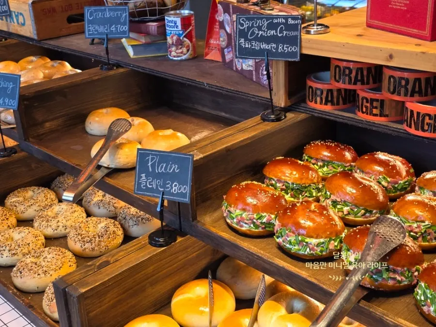 Orange Bagel takeout box with bagels