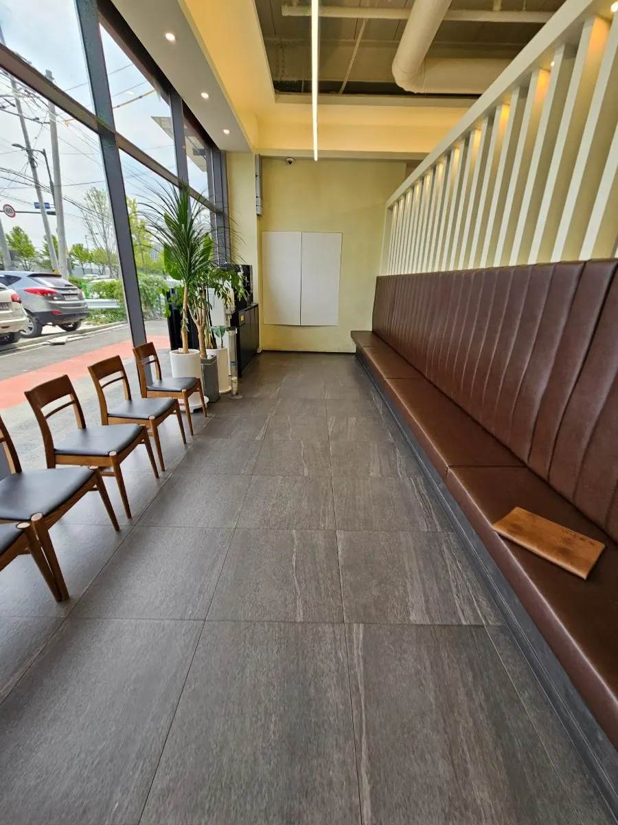 Interior of the waiting room with wait number display