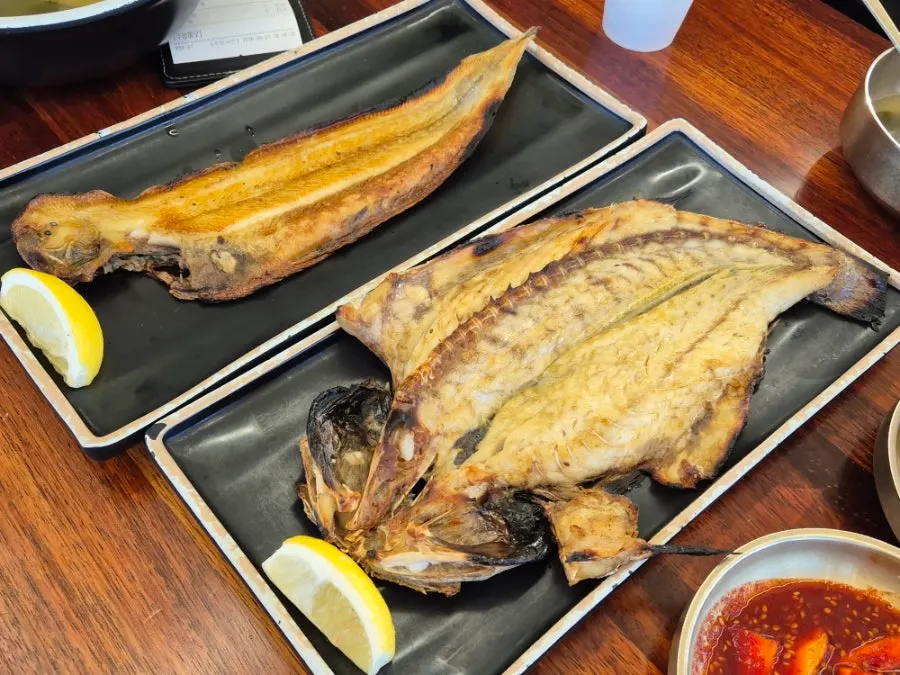 Grilled fish with crisped-up skin