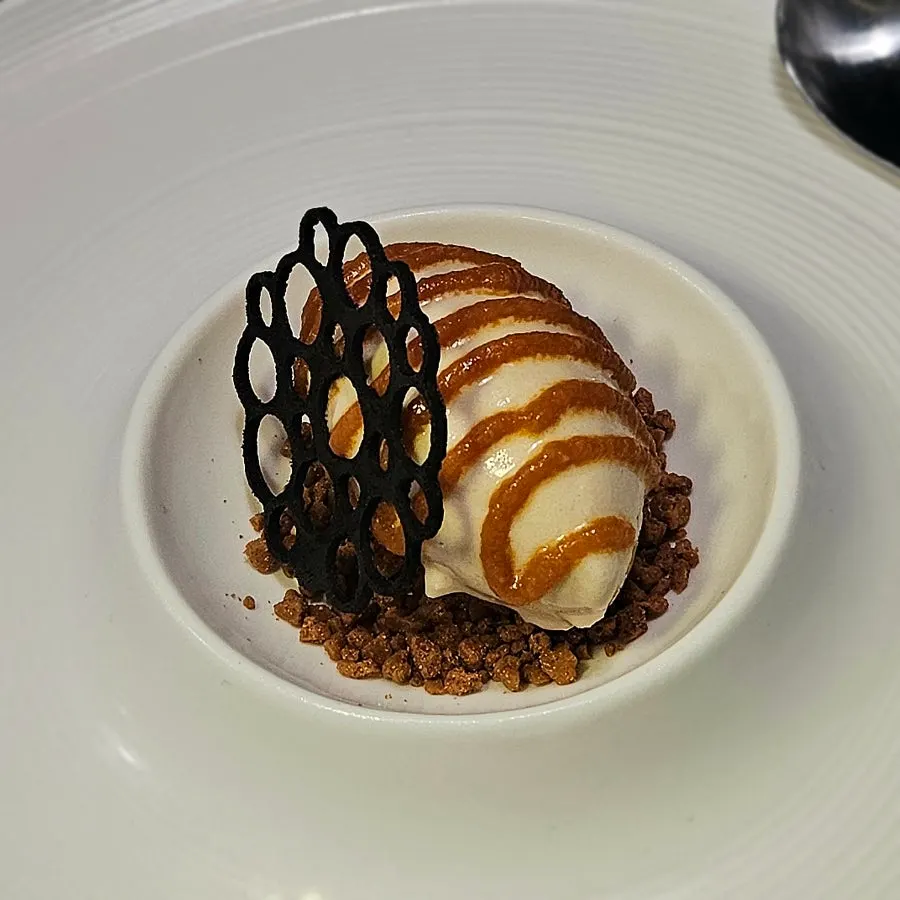 Earl Grey ice cream over a bed of cookie crumble