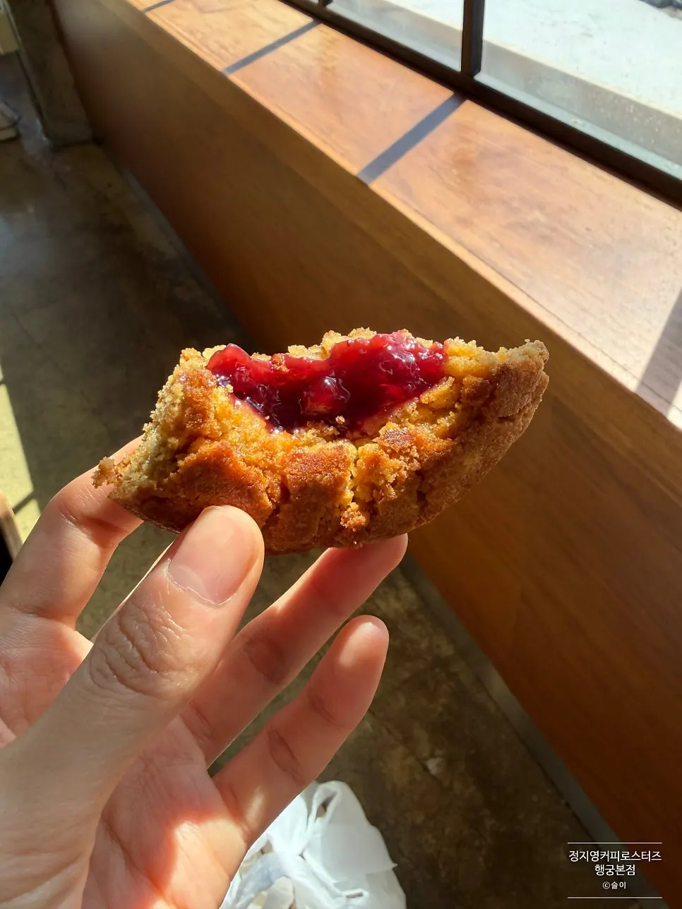 Peanut American cookie with strawberry jam