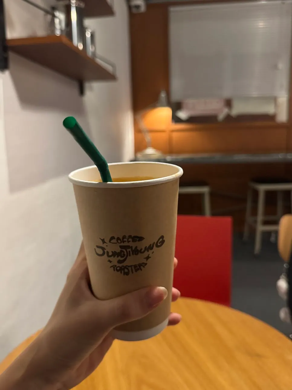 Coconut latte set on a 2nd-floor table
