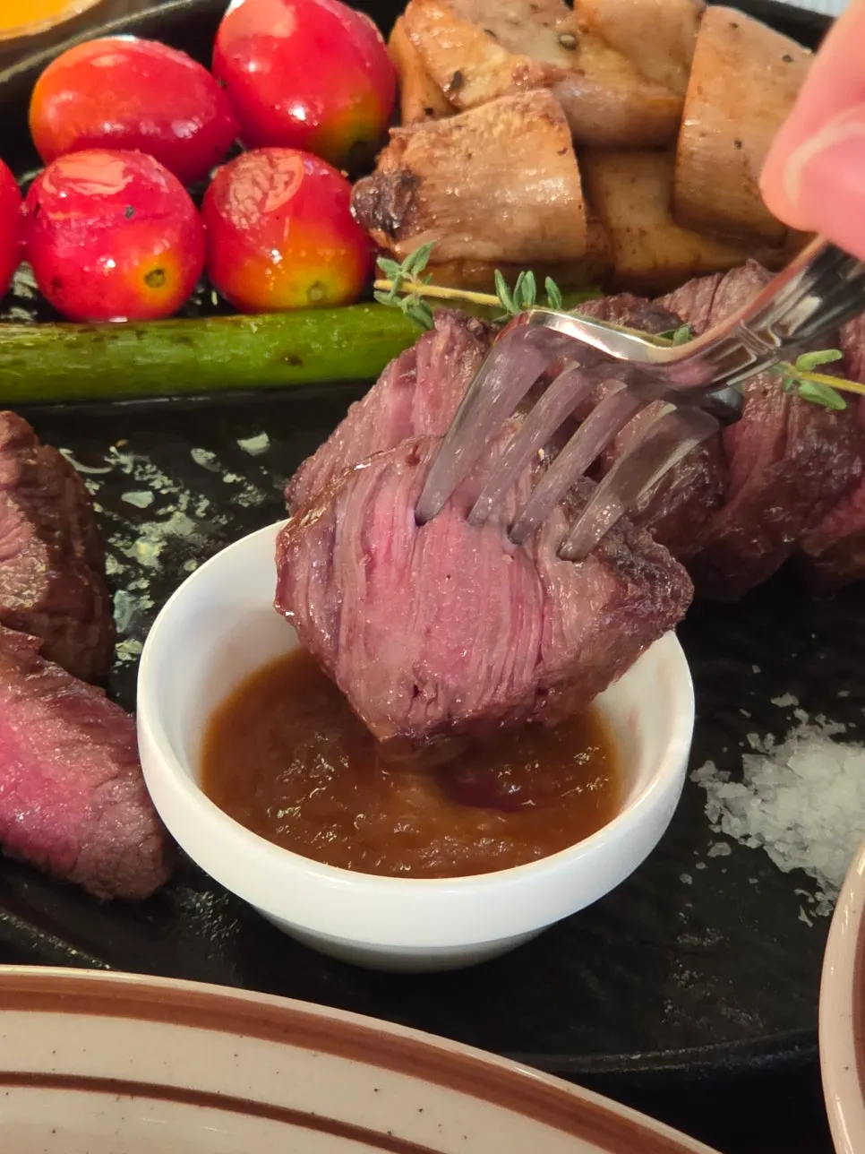 A moist cross-section of the salchisal steak