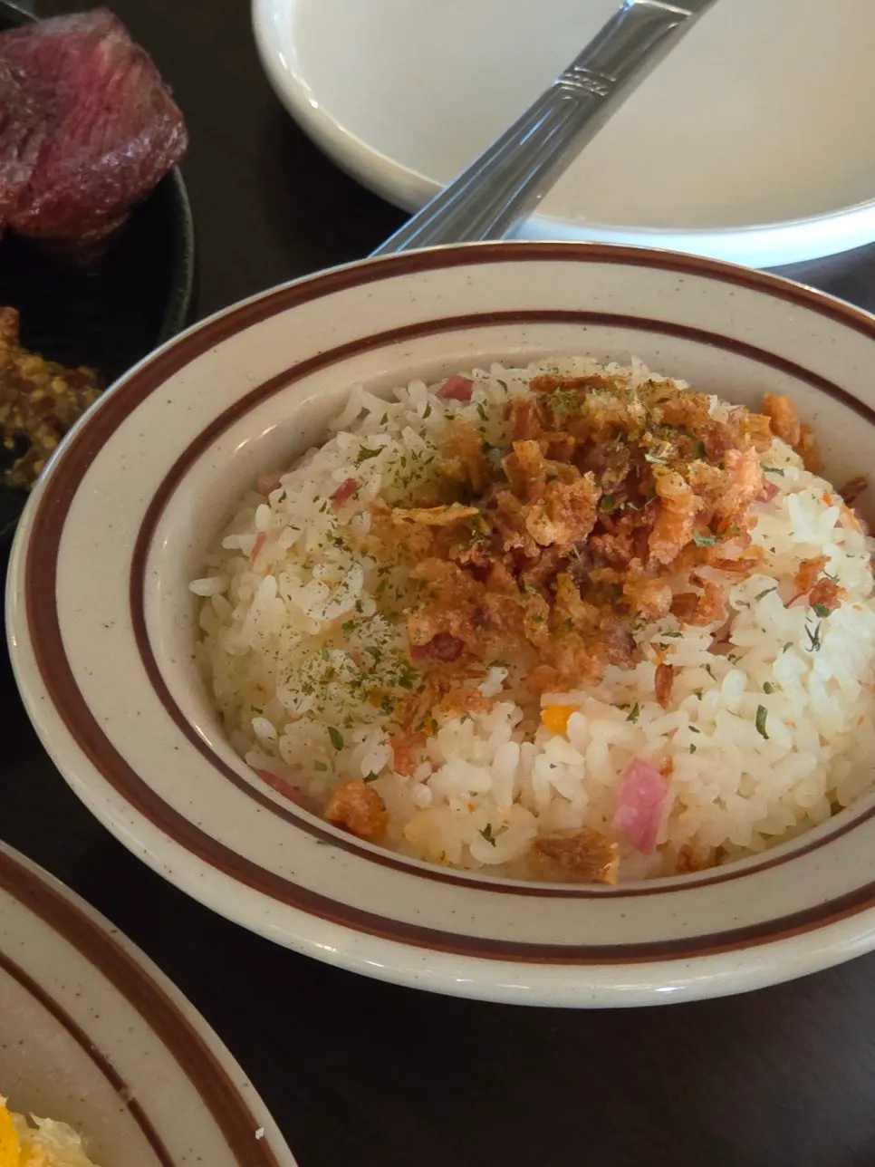 Butter rice ordered as an add-on at Nonchalant Lounge