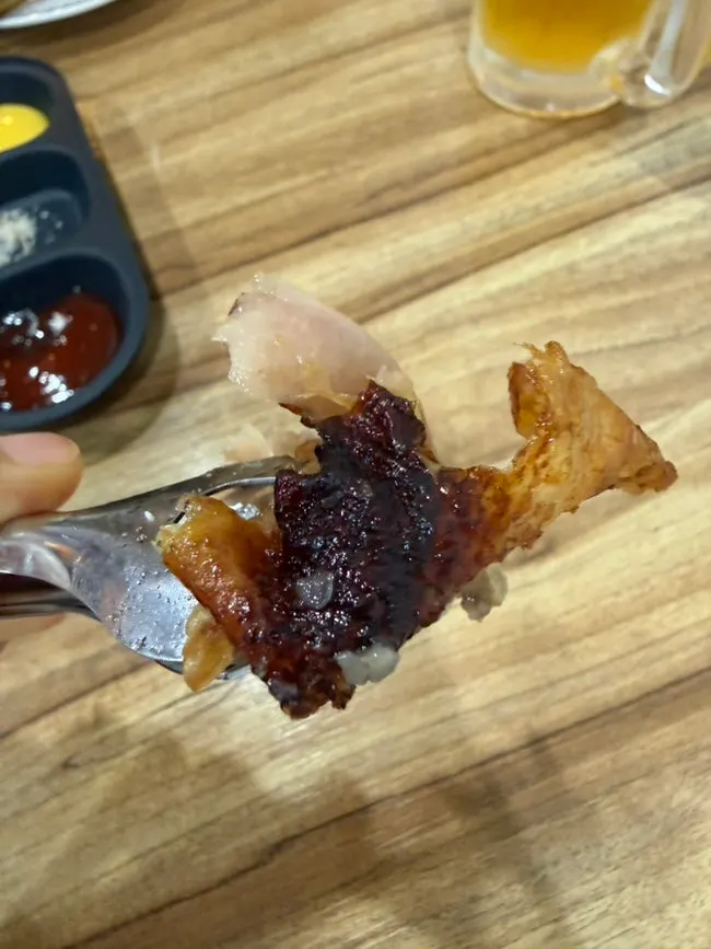 Close-up of the crispy roasted chicken skin