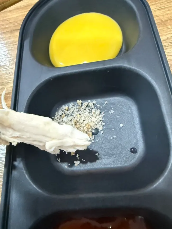 Chicken meat showing its juicy interior