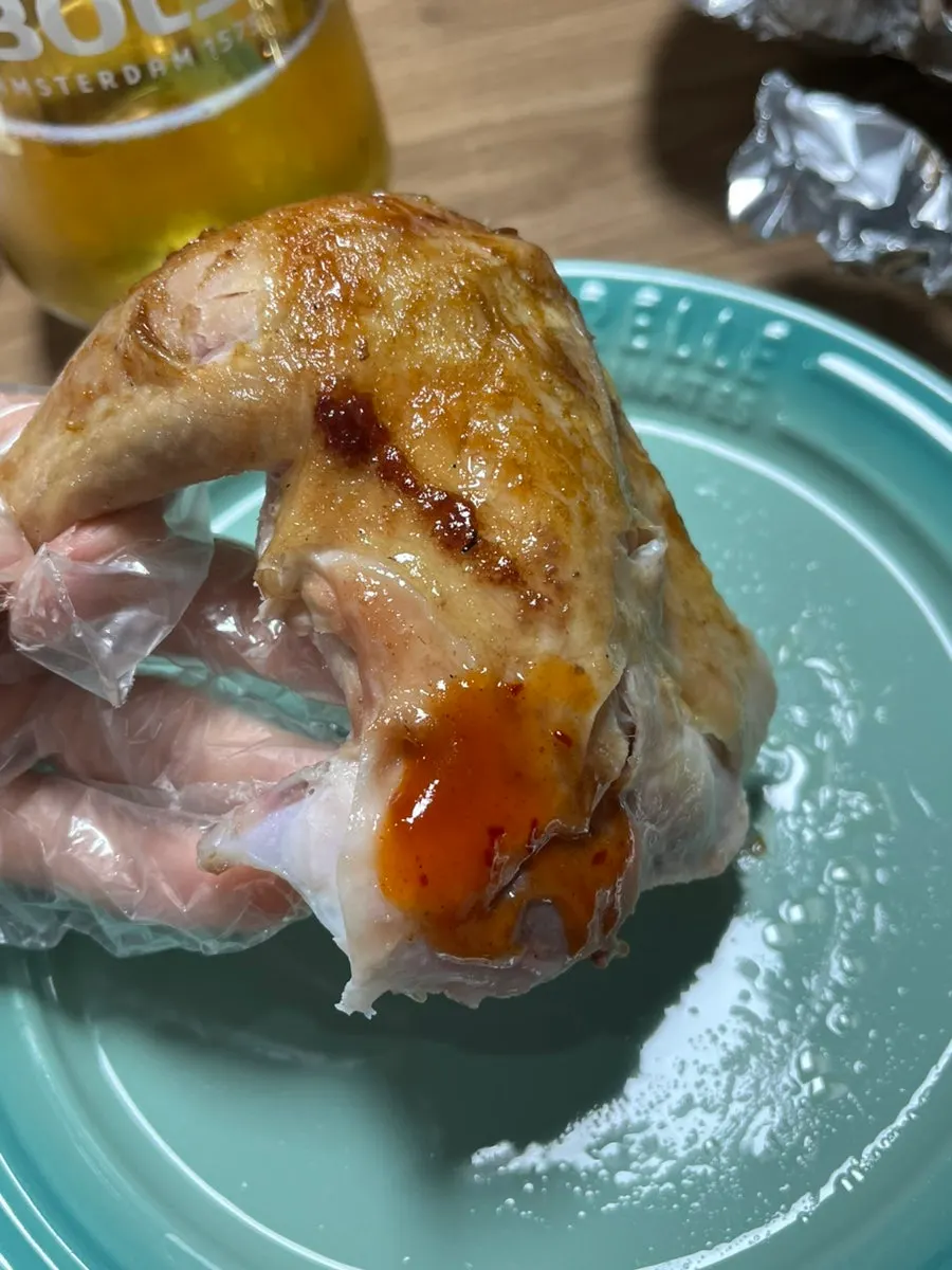 Drumstick meat dipped in sauce