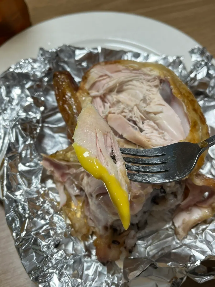 Breast meat dipped in mustard