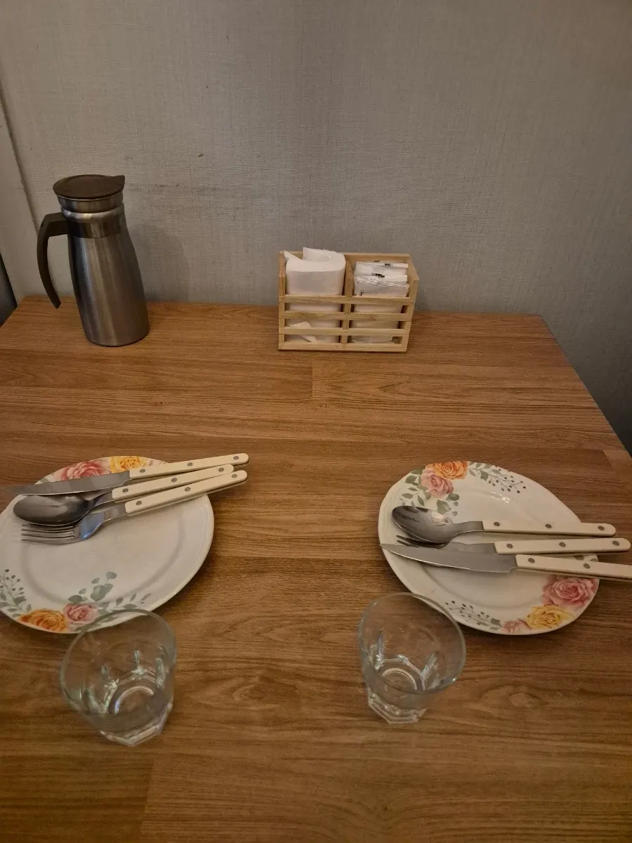 Restaurant seating filled with evening diners