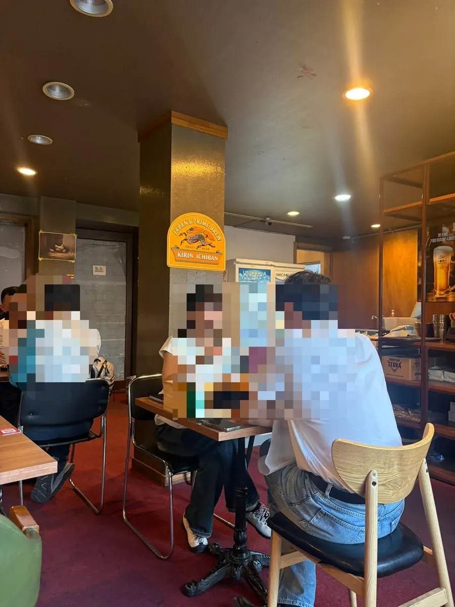 Interior of Haenggung Jangjak Hanbang Tongdak full of customers