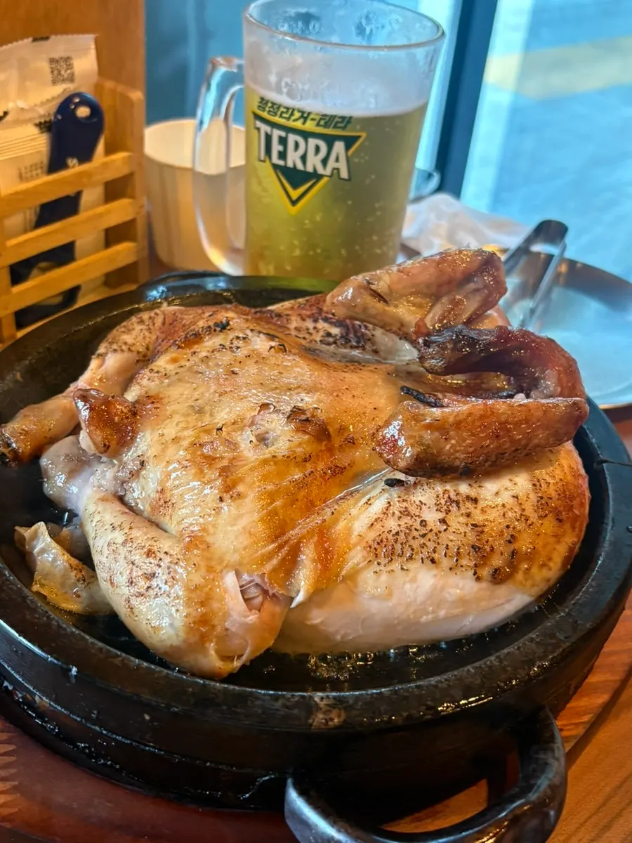 A full spread of herbal oak-fired whole chicken