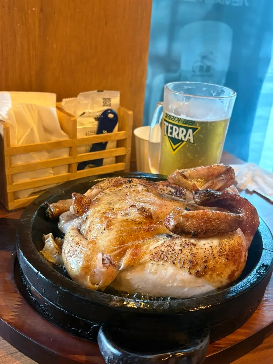 Whole chicken roasted in the oak-wood fire oven