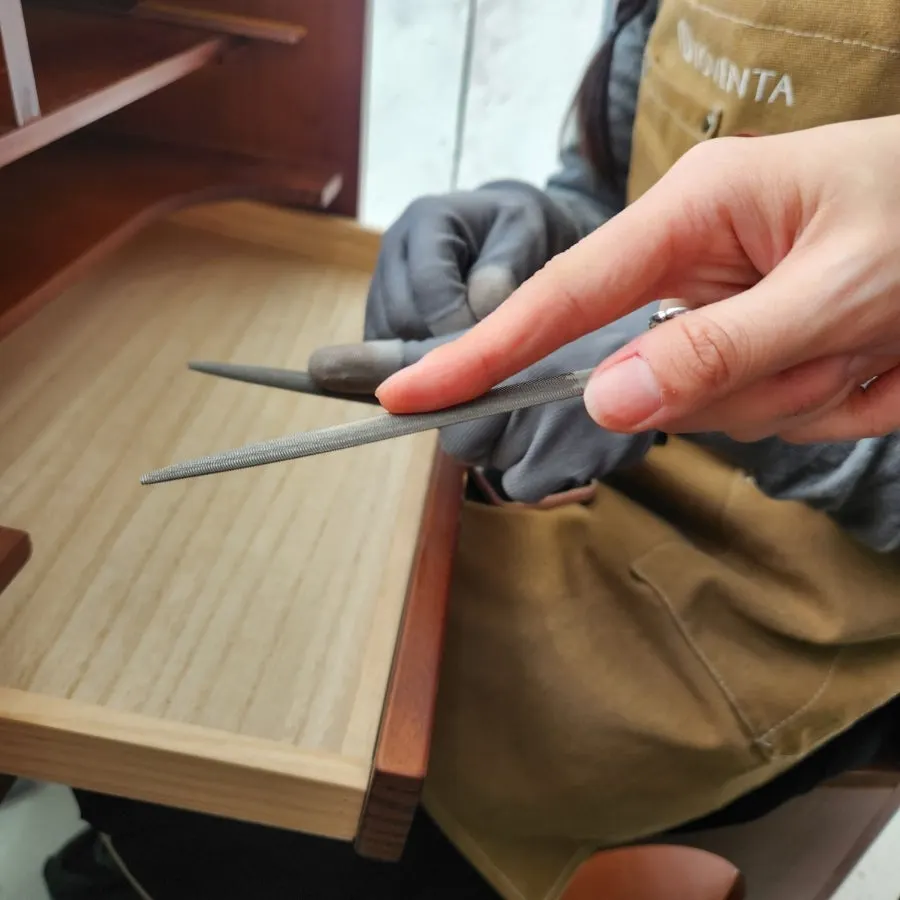 Ring-filing tools laid out on the work table