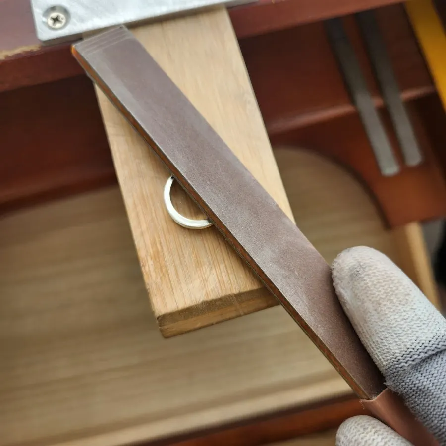 Filing the ring with gloves on
