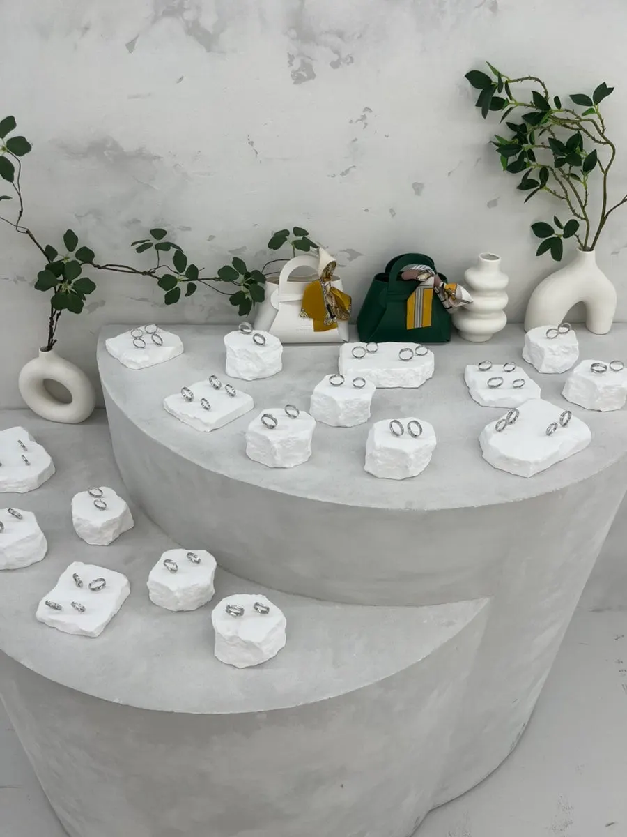 Close-up of displayed silver 925 ring samples