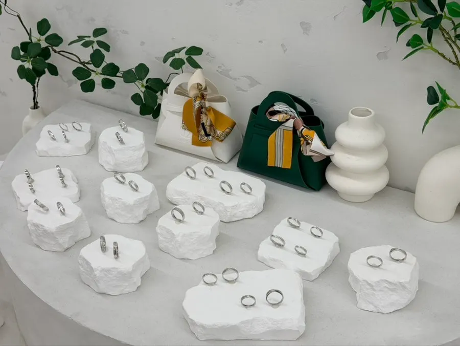 Ring design samples displayed in the workshop