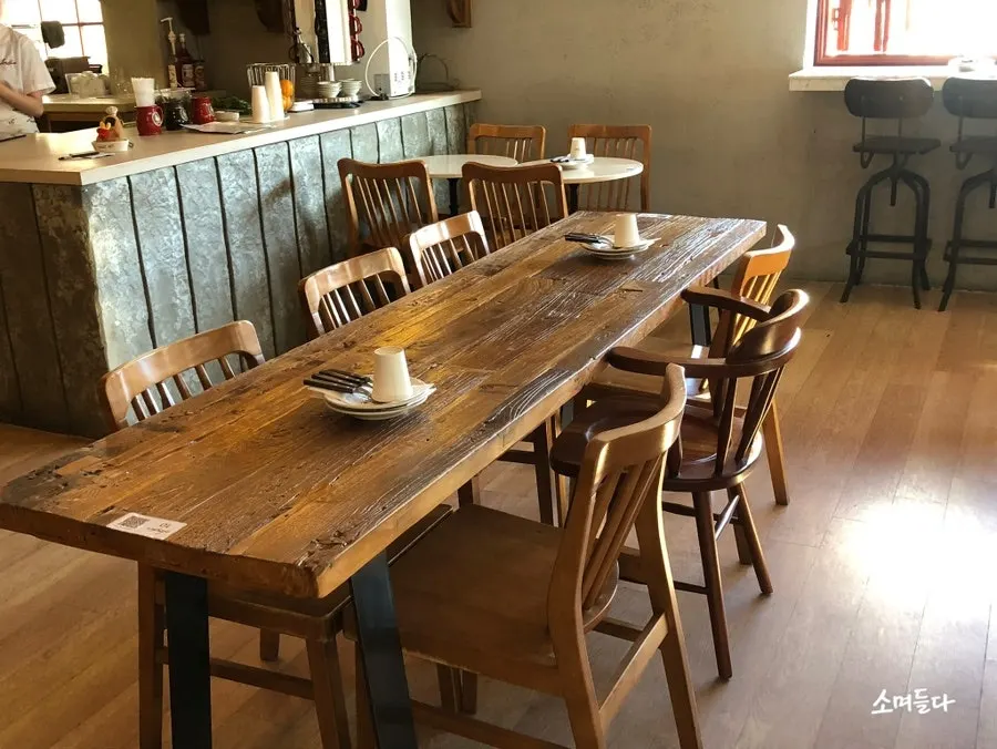 Interior with wooden tables and chairs