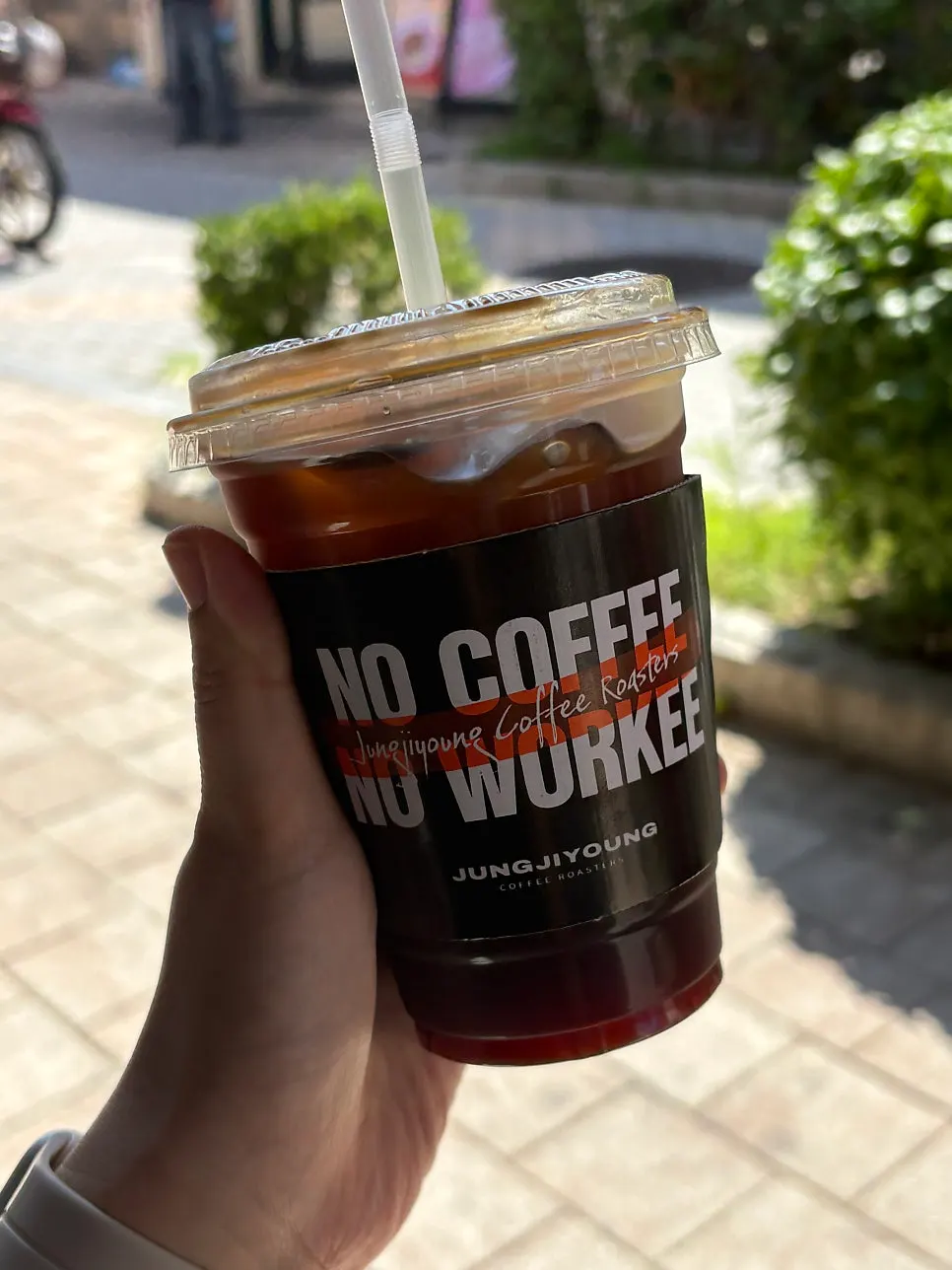 Americano placed on an outdoor seating table