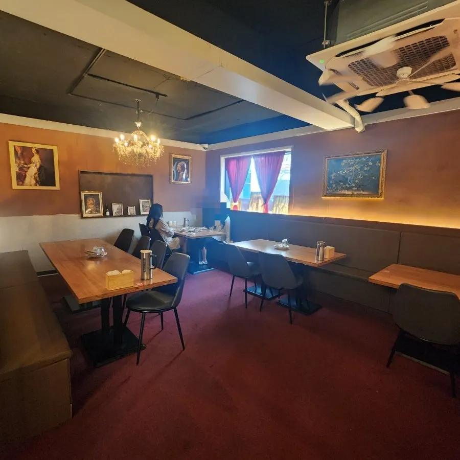 Restaurant tables continuing along both sides