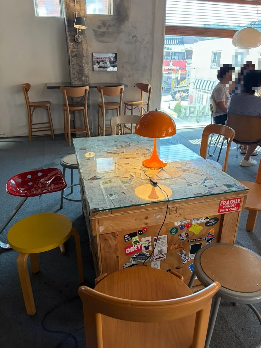 Second-floor café seating overlooking the window
