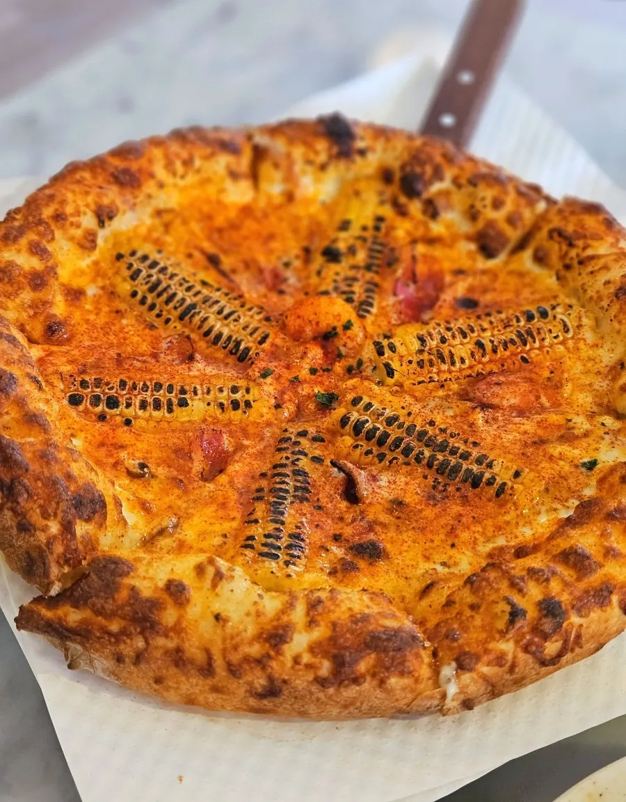 Soft, puffy wood-fired pizza crust