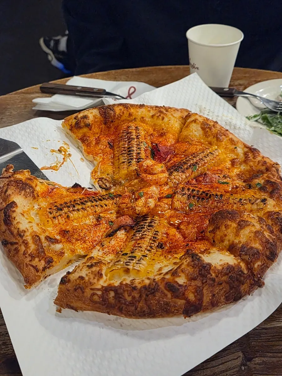 Corn pizza with popping kernels
