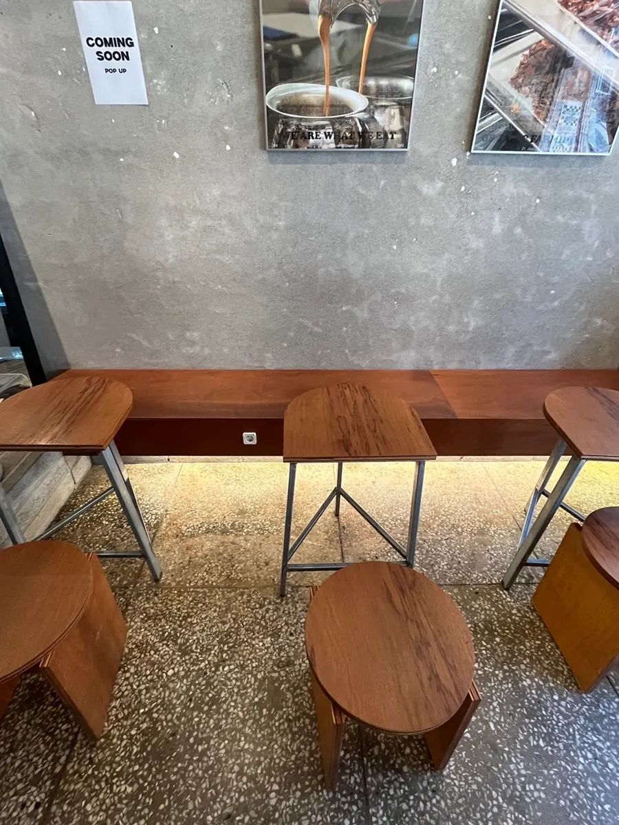 Tables inside the compact café