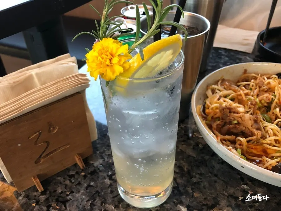 Non-alcoholic lemon squash ordered with anju
