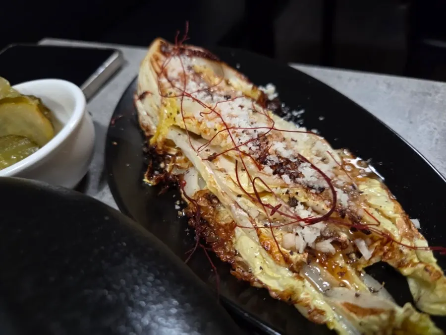 Grilled napa cabbage salad showing its layered texture