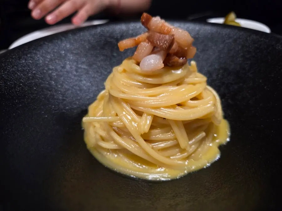 Close-up of Hado's carbonara pasta