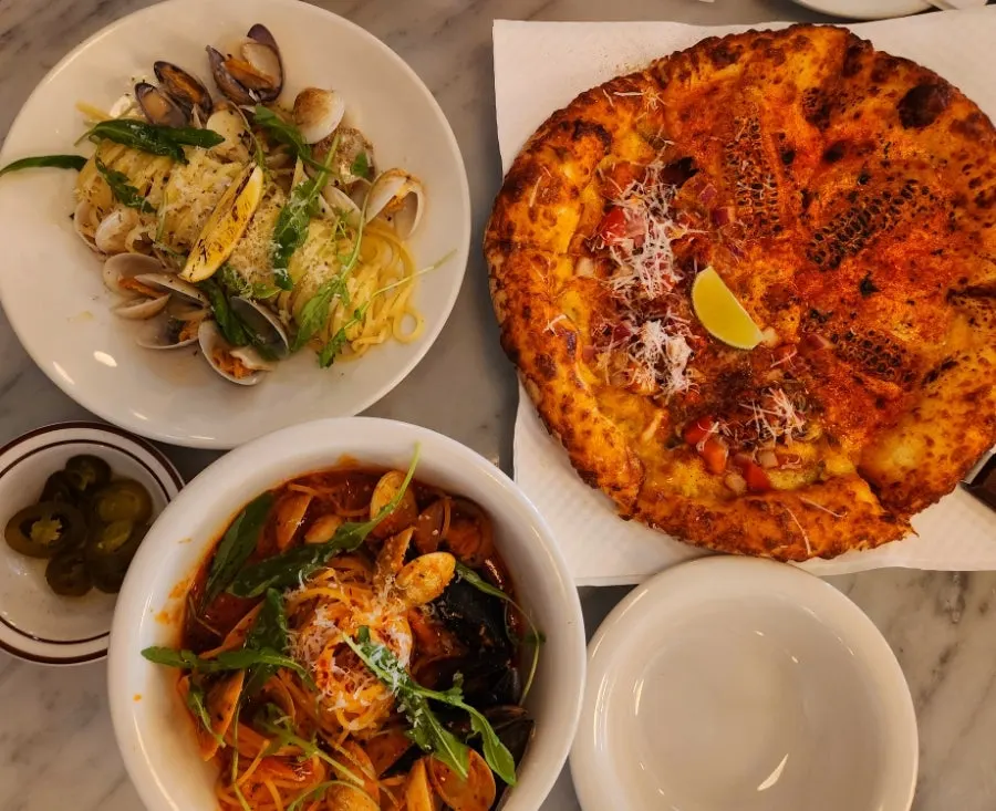 Pasta and half-and-half pizza spread