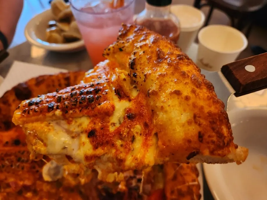 Eating taco pizza