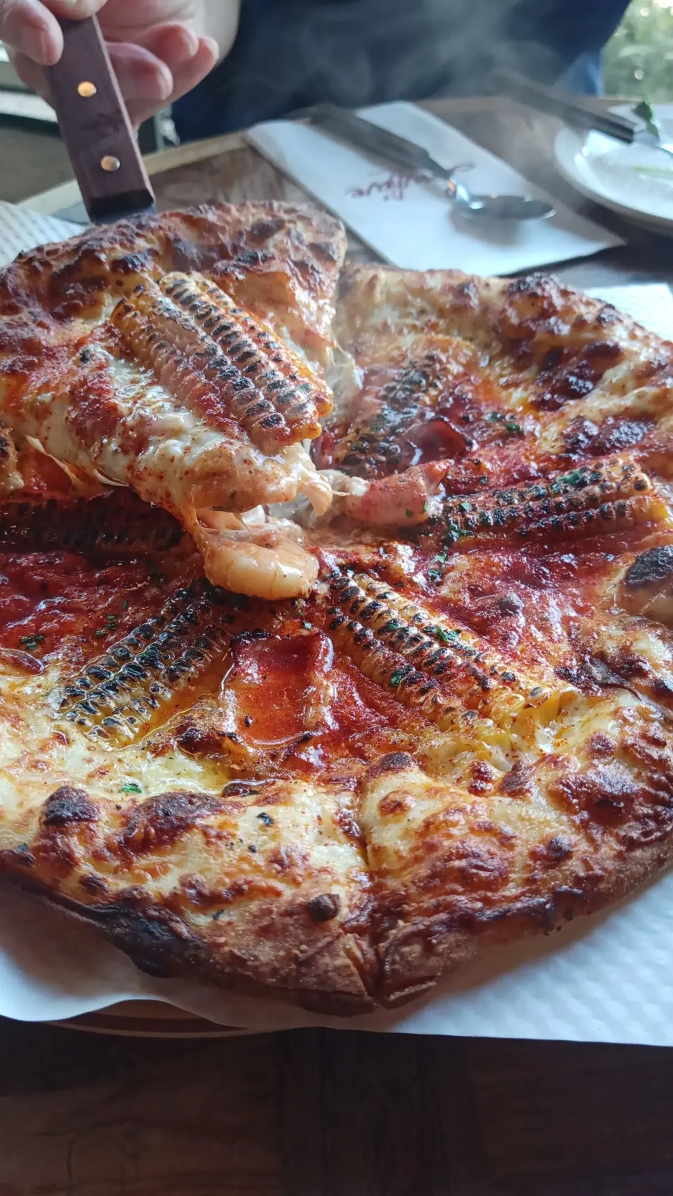 Vertical photo related to Low Five corn pizza