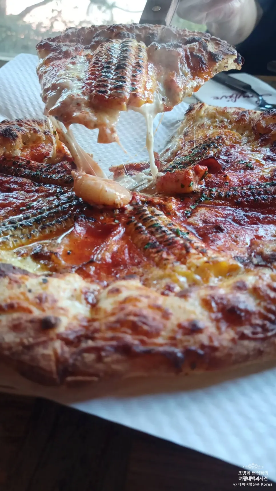 Vertical photo related to Low Five corn pizza